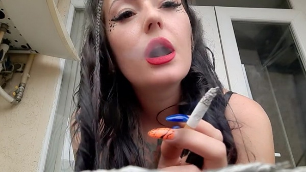 Dominatrix Nika Smokes a Cigarette And Blows Smoke In Your Face